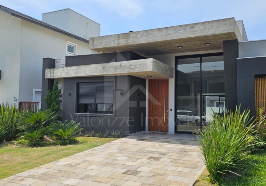 Casa em Condominio 4 dormitorios