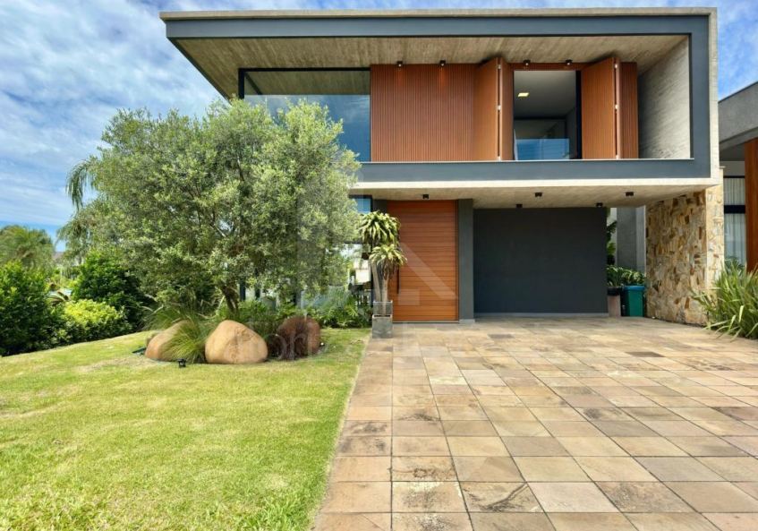 Casa em Condominio 4 dormitorios