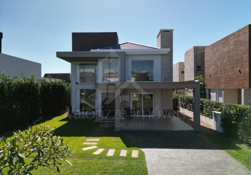 Casa em Condominio 5 dormitorios