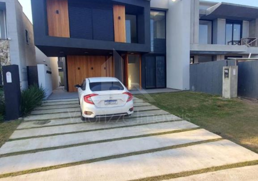 Casa em Condominio 4 dormitorios