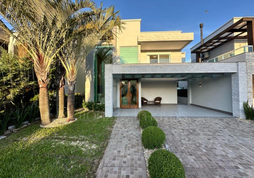 Casa em Condominio 4 dormitorios
