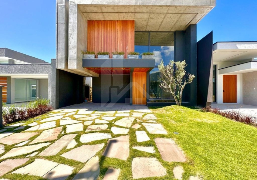 Casa em Condominio 4 dormitorios