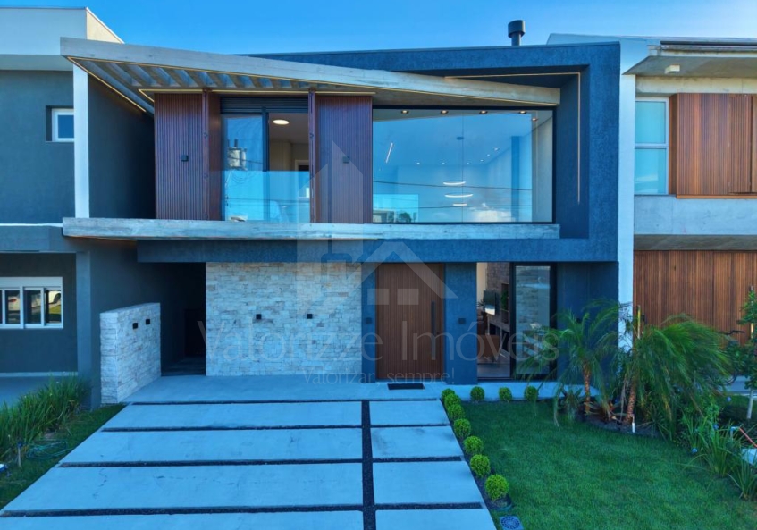 Casa em Condominio 4 dormitorios