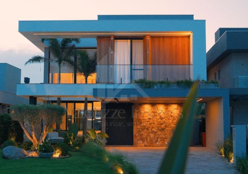Casa em Condominio 5 dormitorios