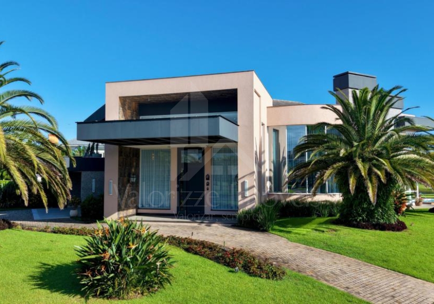Casa em Condominio 5 dormitorios