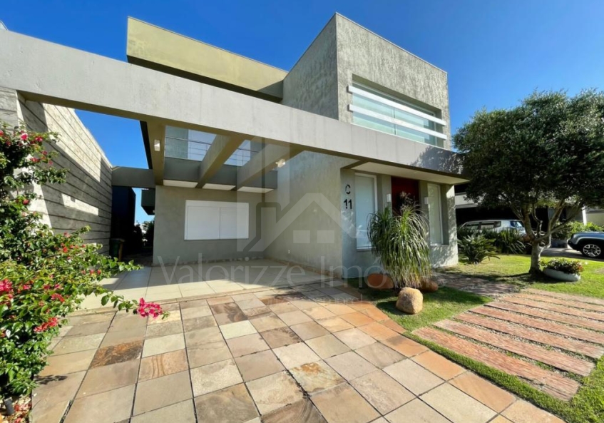 Casa em Condominio 4 dormitorios