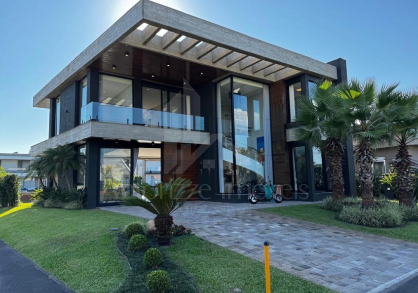 Casa em Condominio 5 dormitorios
