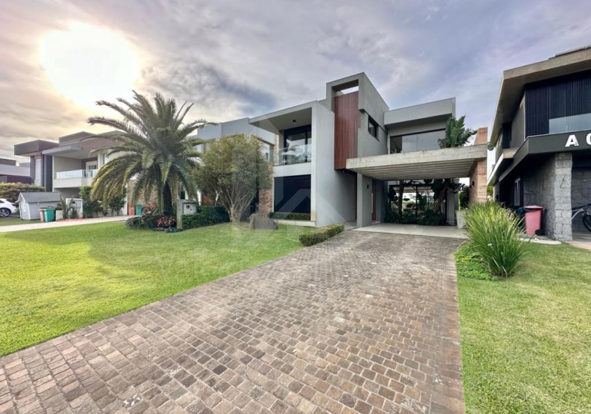 Casa em Condominio 4 dormitorios
