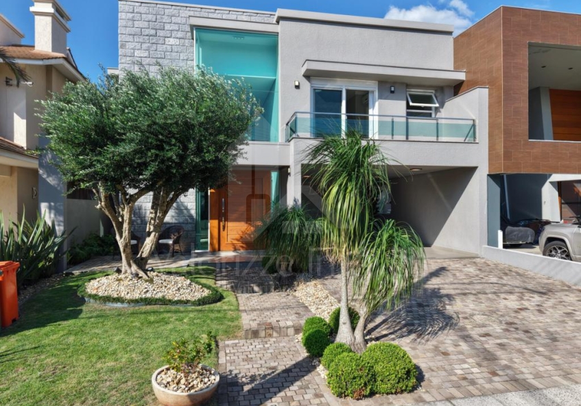Casa em Condominio 4 dormitorios