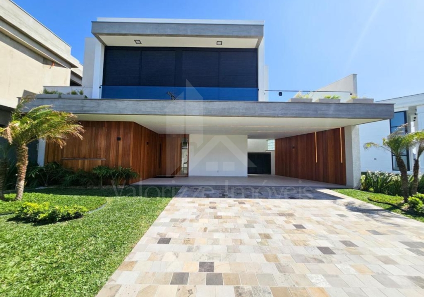 Casa em Condominio 5 dormitorios