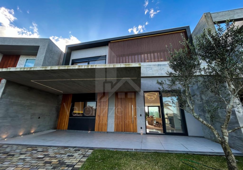 Casa em Condominio 4 dormitorios