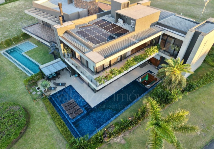 Casa em Condominio 5 dormitorios