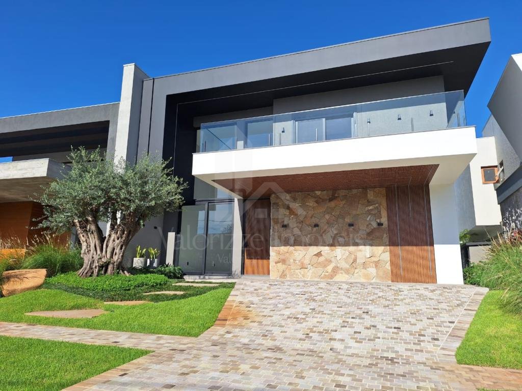 Casa em Condominio 5 dormitorios