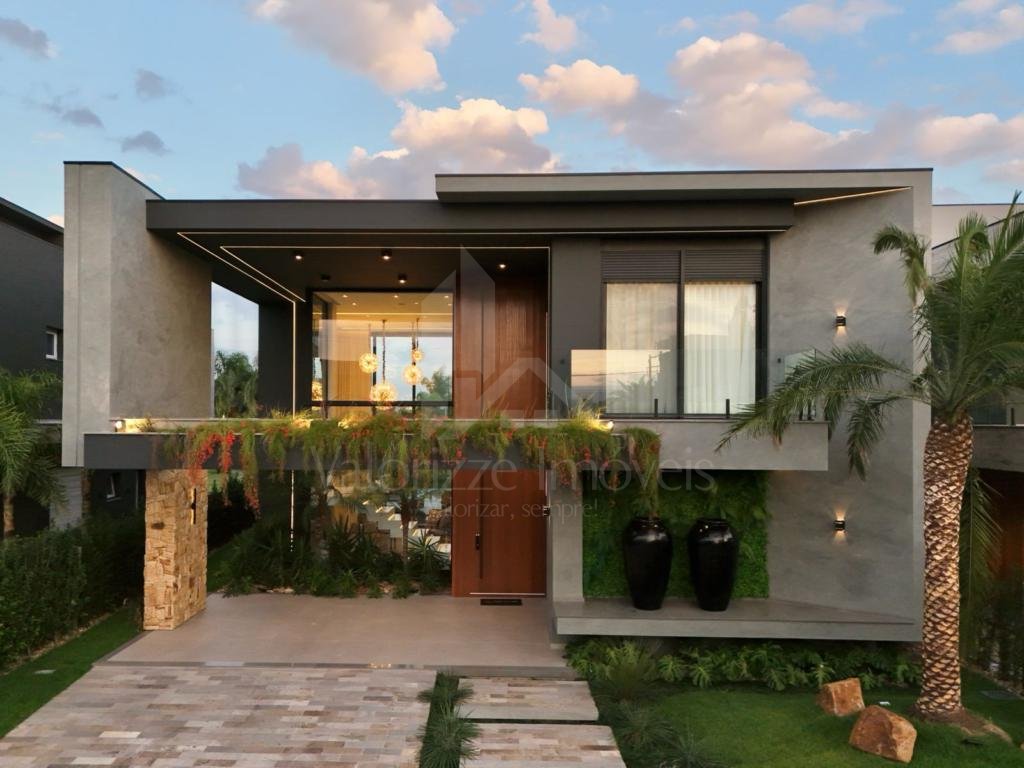 Casa em Condominio 5 dormitorios