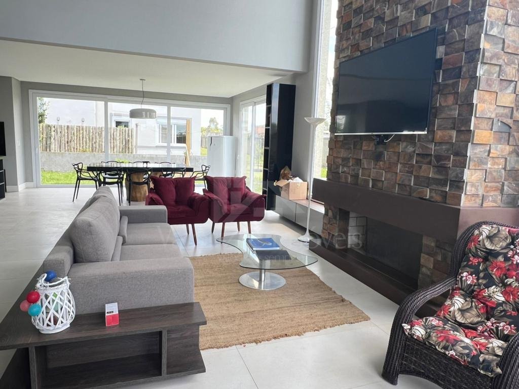 Casa em Condominio 5 dormitorios