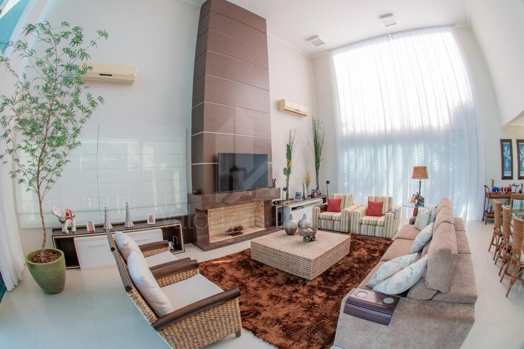 Casa em Condominio 5 dormitorios