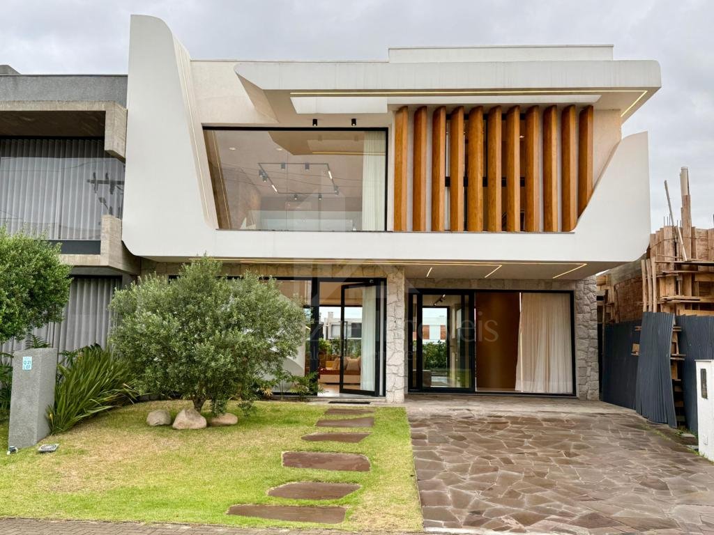 Casa em Condominio 4 dormitorios