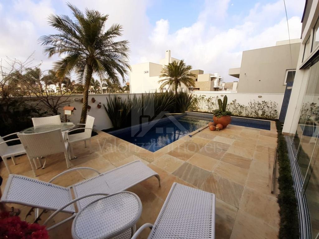 Casa em Condominio 5 dormitorios