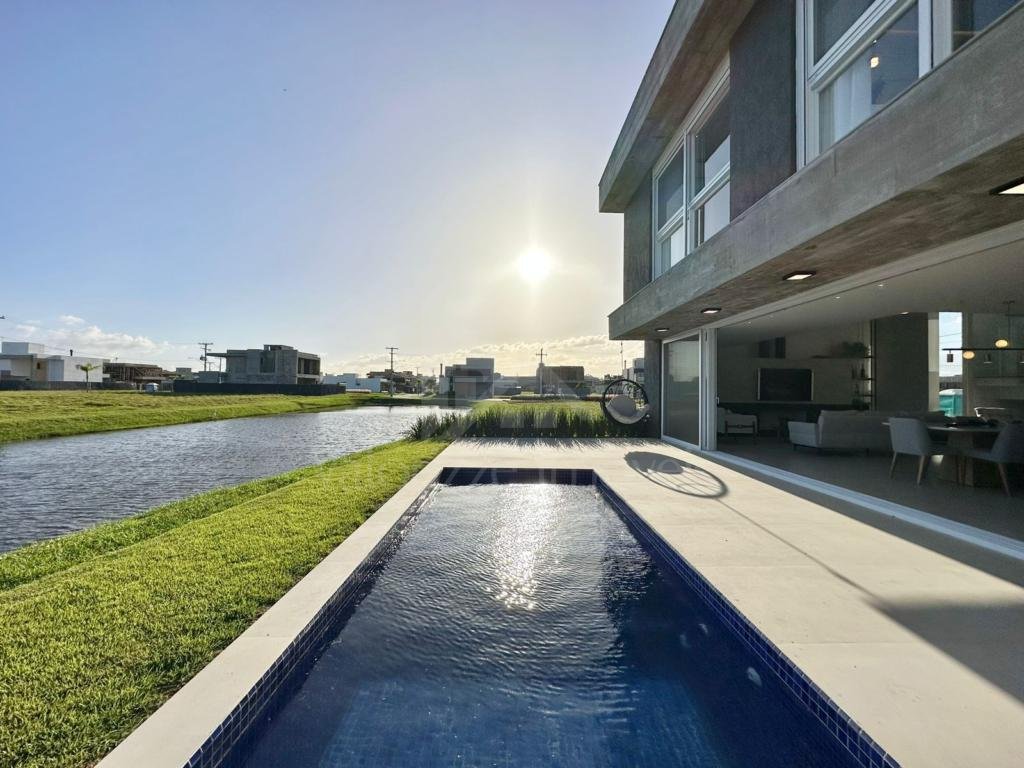 Casa em Condominio 4 dormitorios