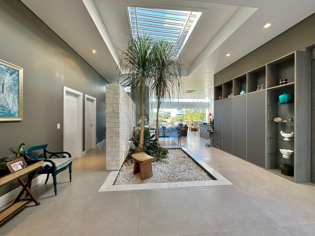 Casa em Condominio 5 dormitorios