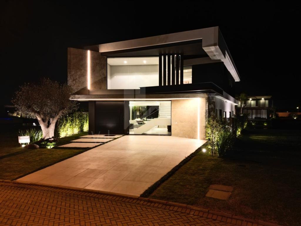 Casa em Condominio 5 dormitorios