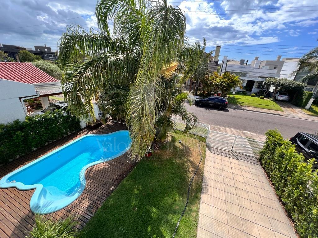 Casa em Condominio 4 dormitorios