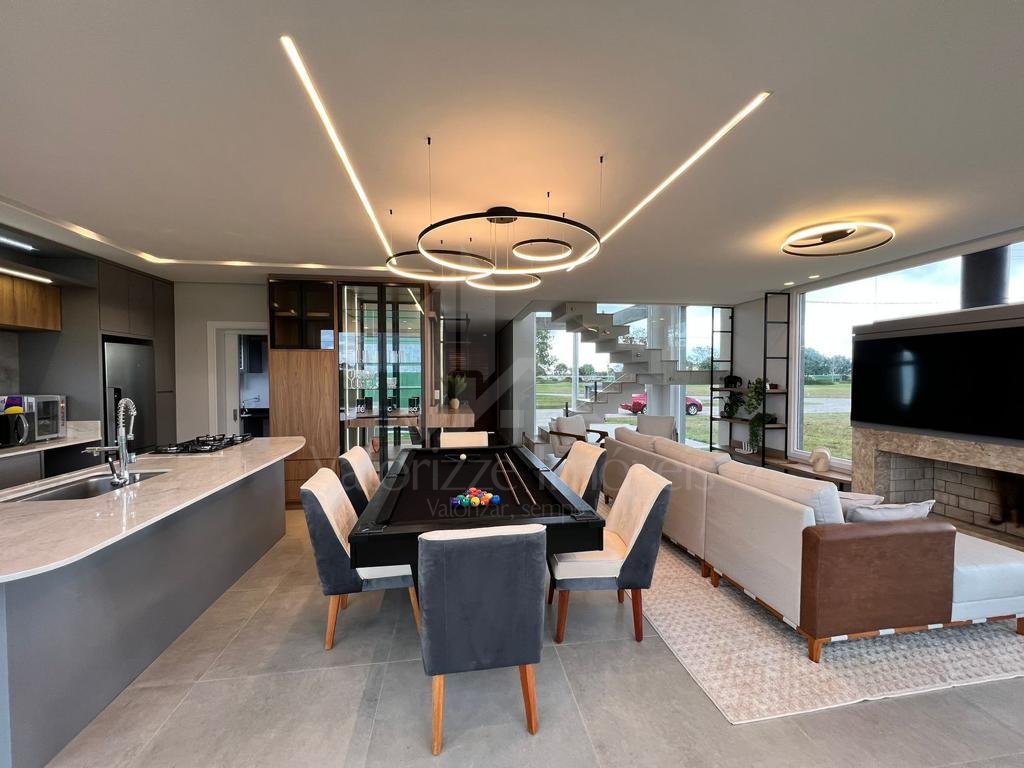 Casa em Condominio 4 dormitorios