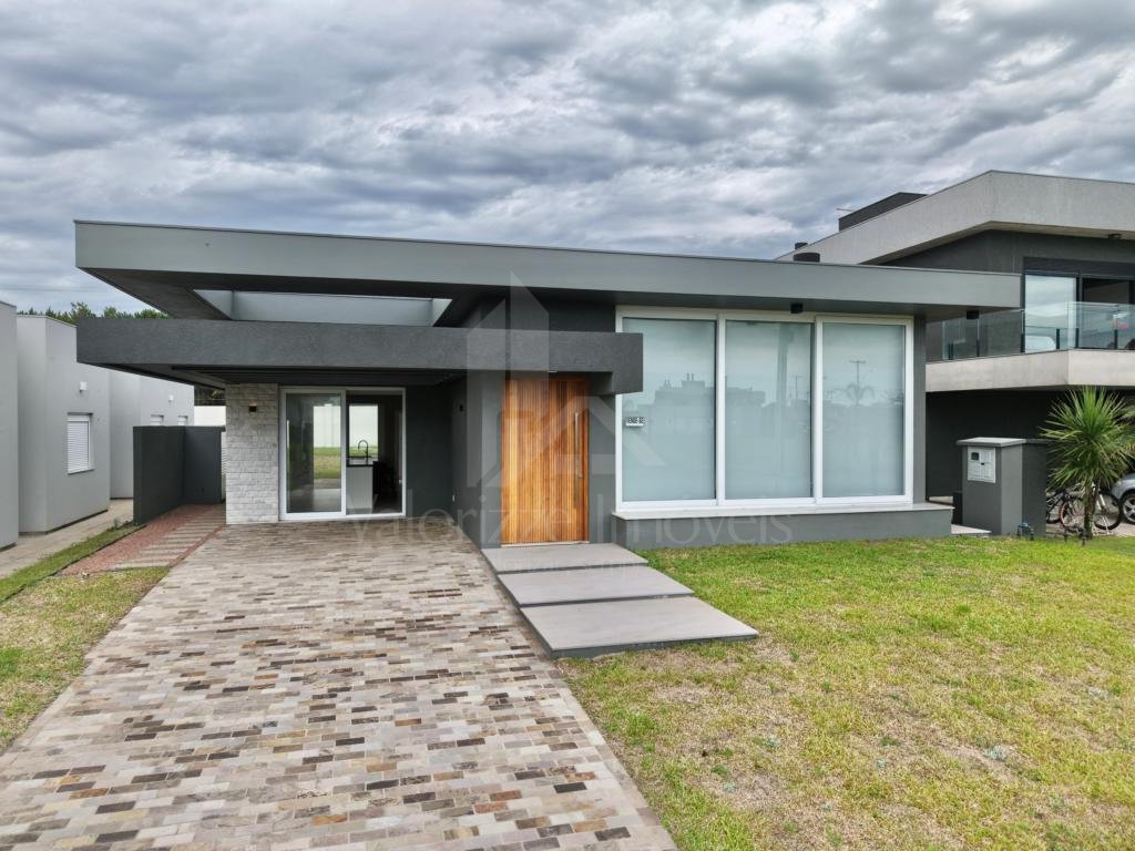 Casa em Condominio 4 dormitorios