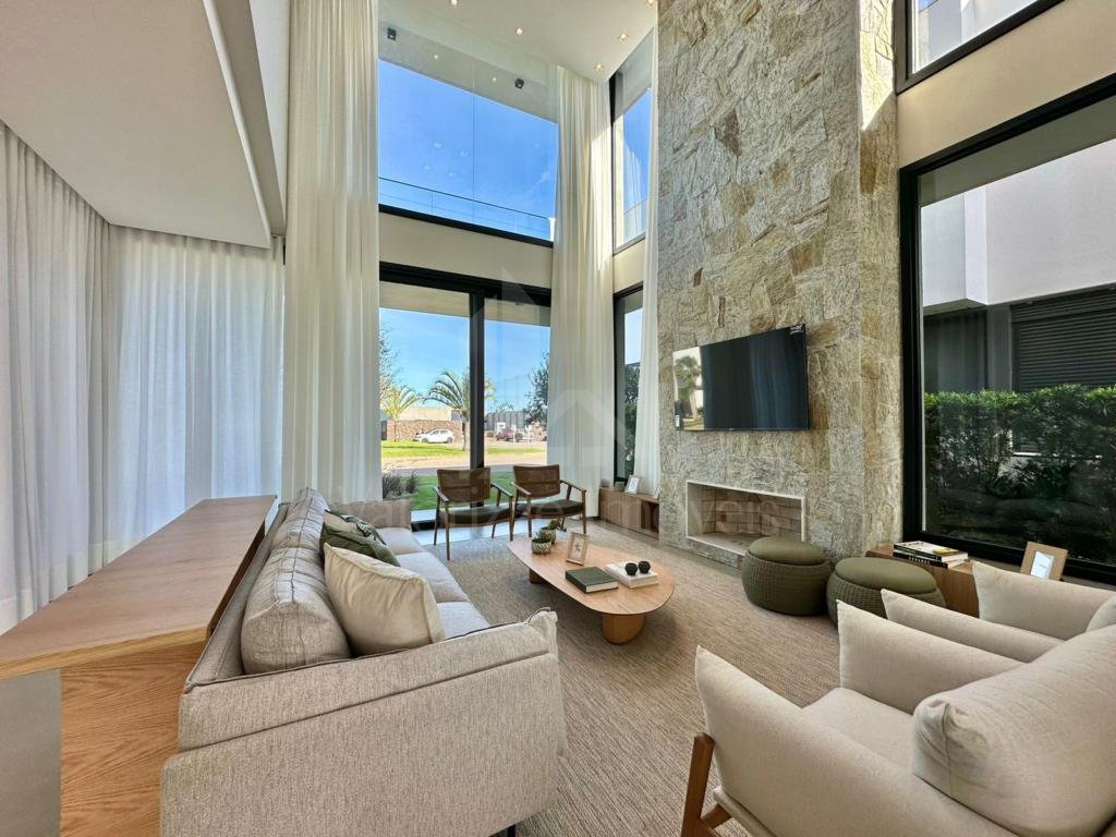 Casa em Condominio 5 dormitorios