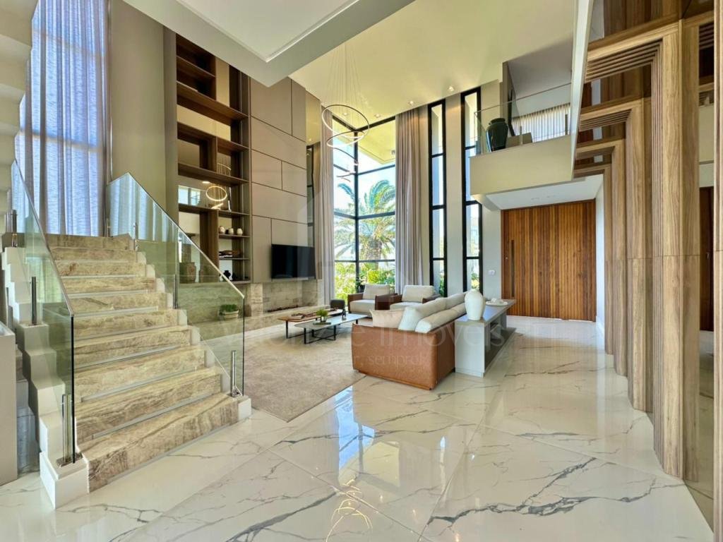 Casa em Condominio 5 dormitorios