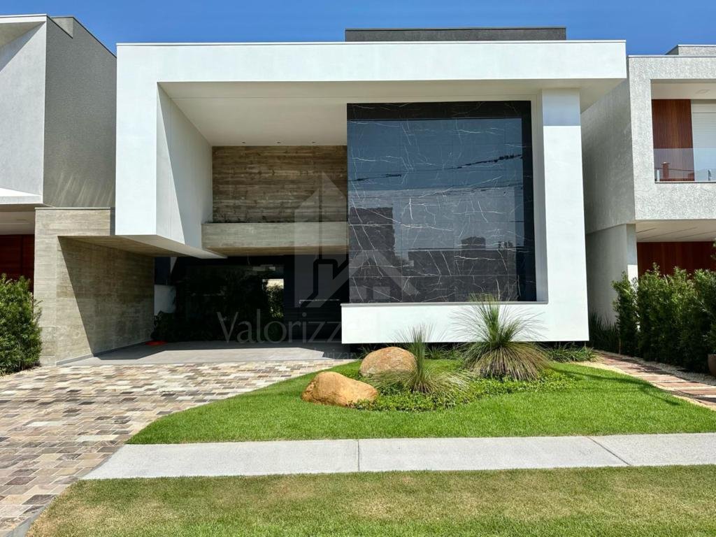 Casa em Condominio 5 dormitorios