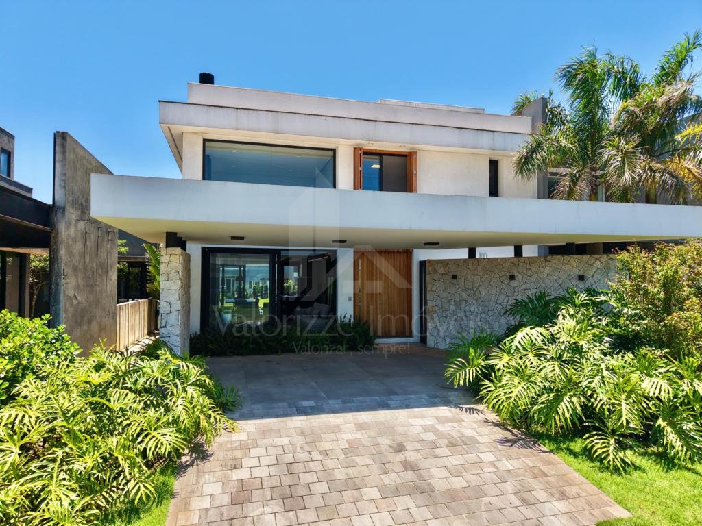 Casa em Condominio 4 dormitorios