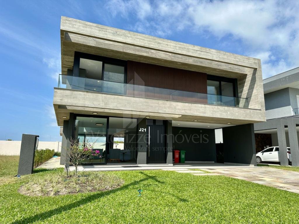 Casa em Condominio 5 dormitorios