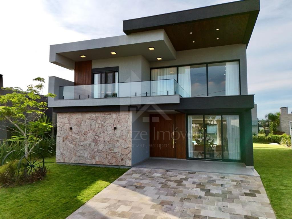 Casa em Condominio 5 dormitorios