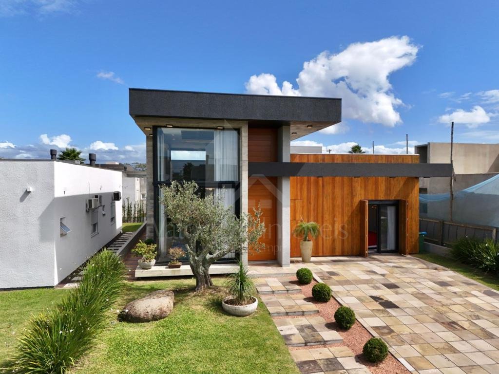 Casa em Condominio 4 dormitorios