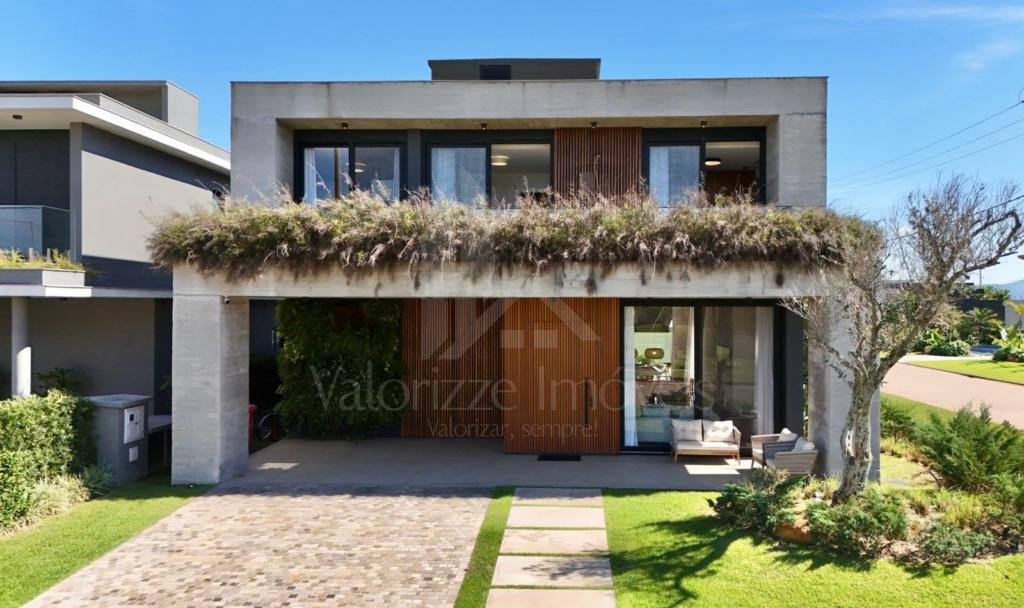 Casa em Condominio 5 dormitorios