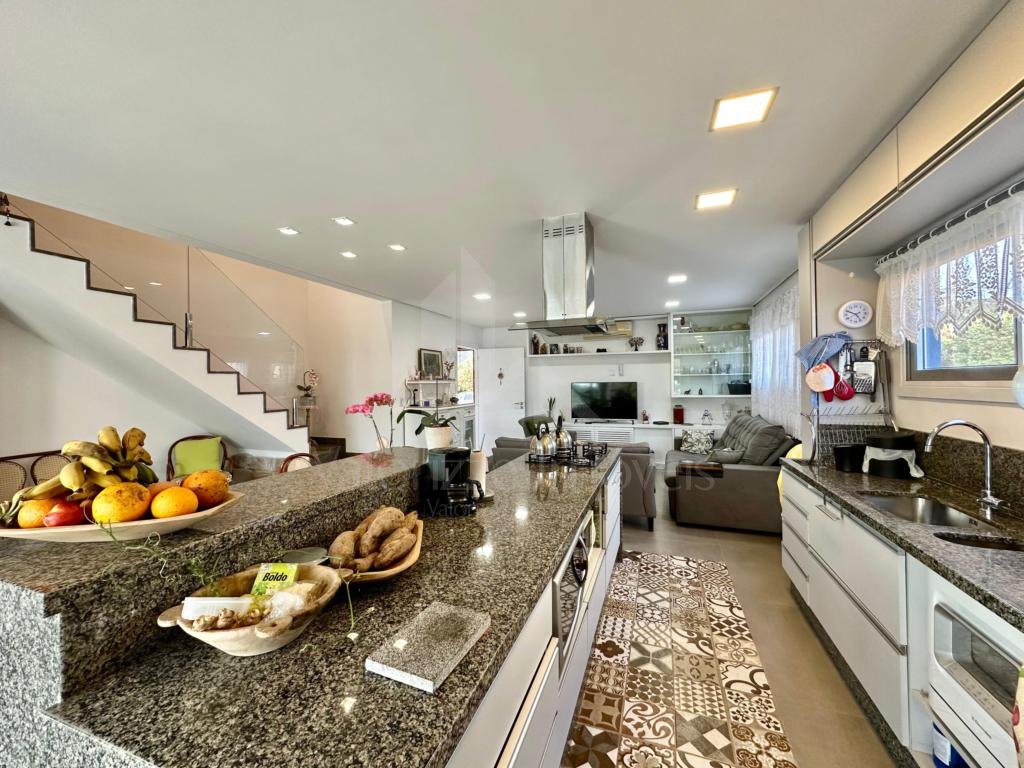 Casa em Condominio 4 dormitorios