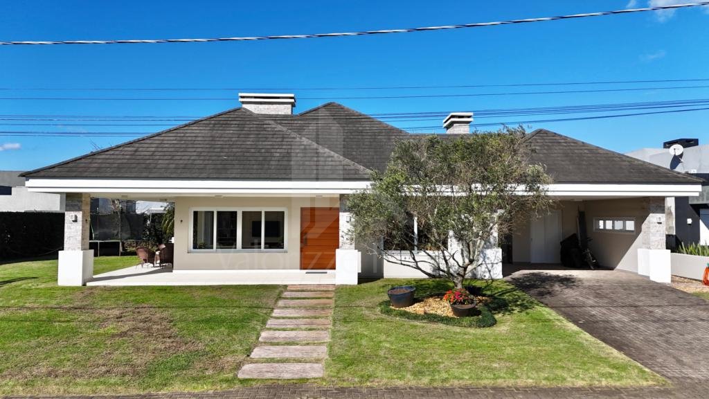 Casa em Condominio 4 dormitorios