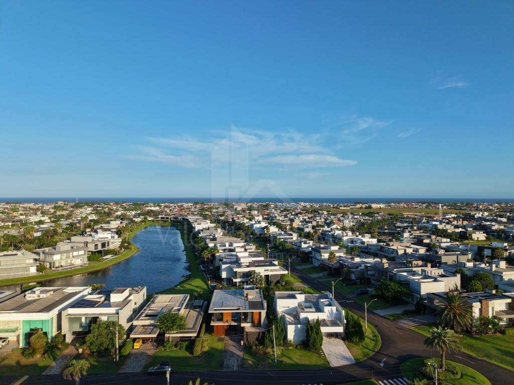 Casa em Condominio 5 dormitorios