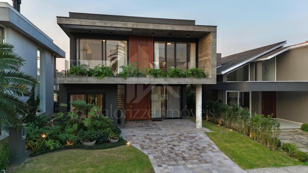 Casa em Condominio 5 dormitorios