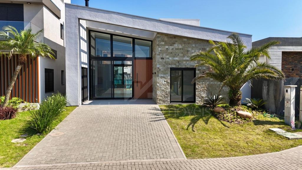 Casa em Condominio 4 dormitorios