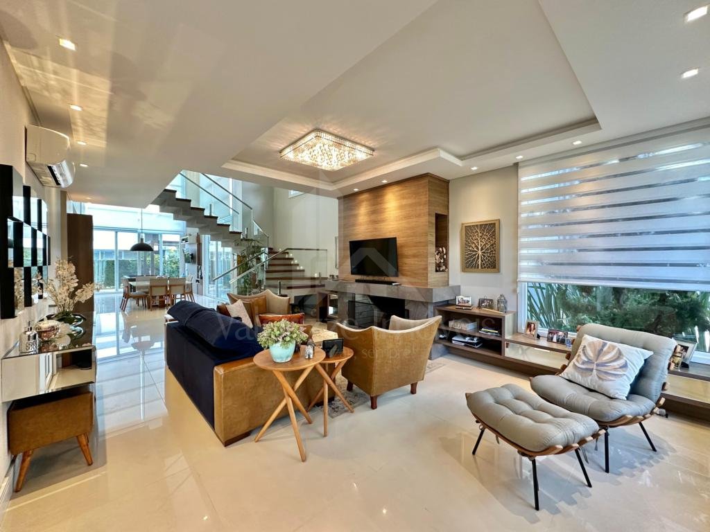 Casa em Condominio 5 dormitorios