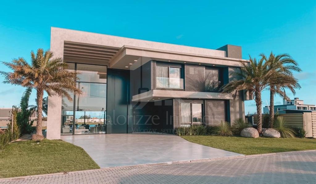 Casa em Condominio 5 dormitorios