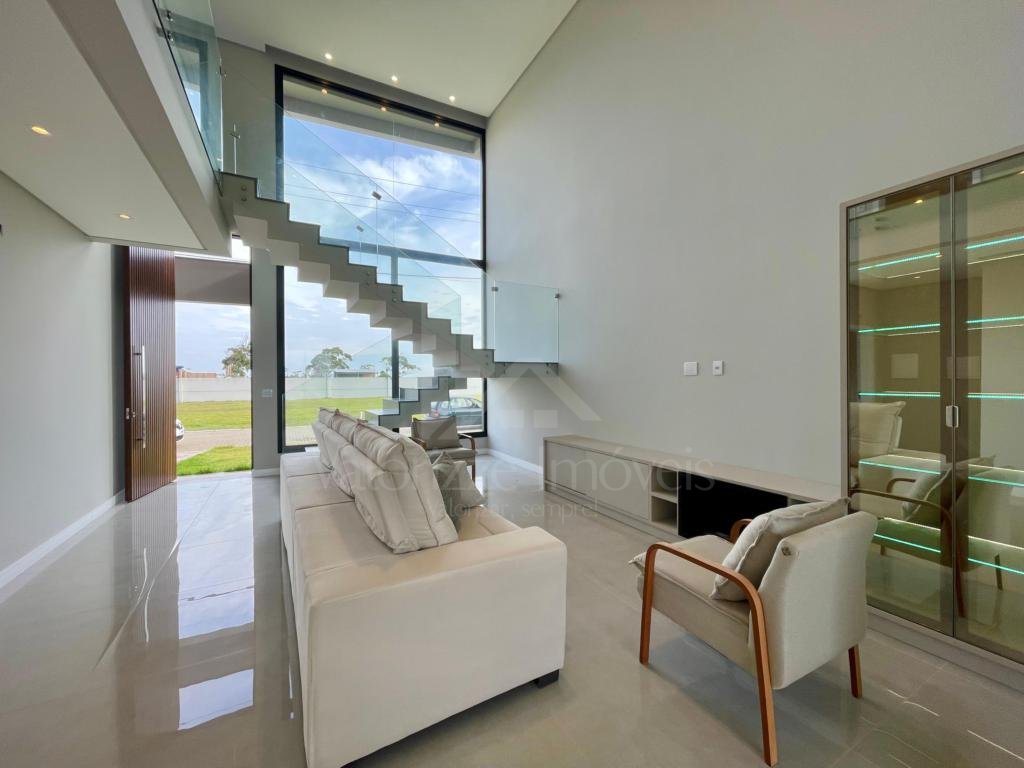 Casa em Condominio 4 dormitorios