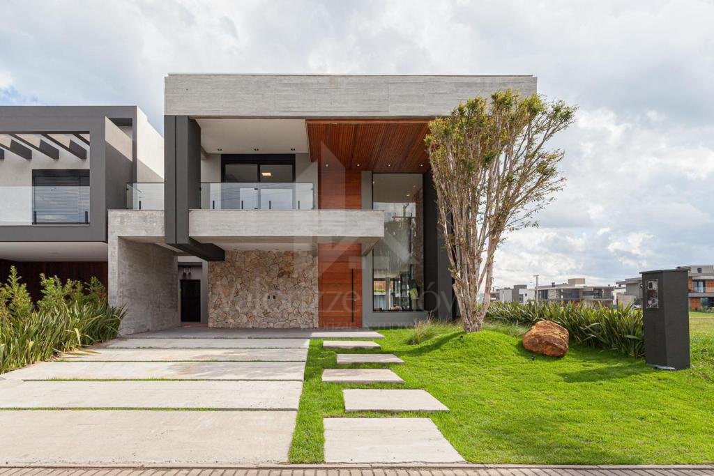 Casa em Condominio 4 dormitorios