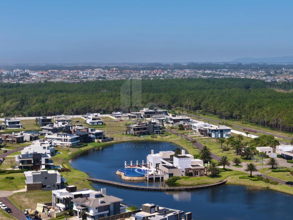 Casa em Condominio 5 dormitorios