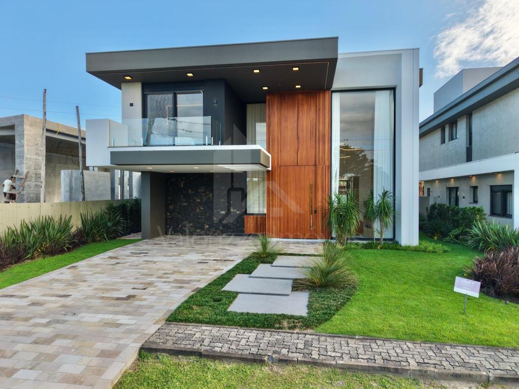 Casa em Condominio 5 dormitorios