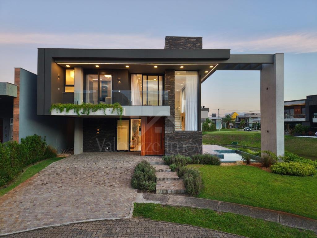 Casa em Condominio 5 dormitorios