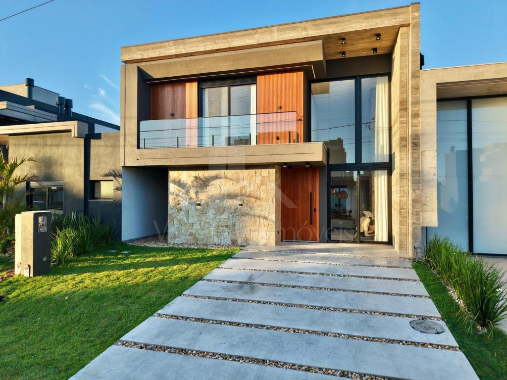 Casa em Condominio 4 dormitorios