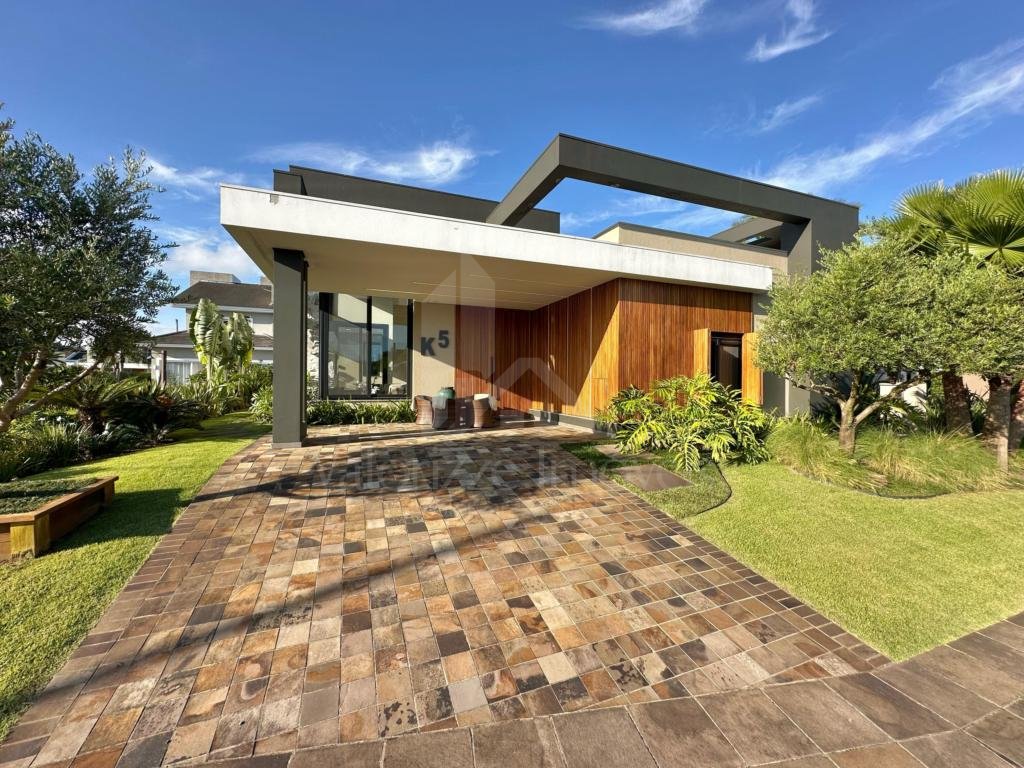 Casa em Condominio 4 dormitorios